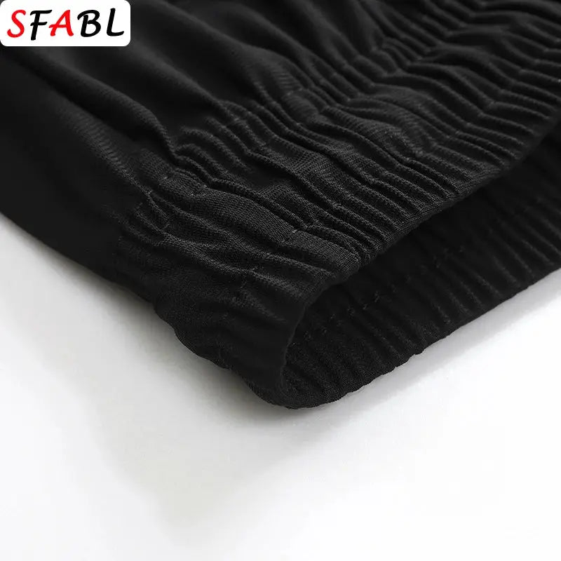 Black Simples Market sports shorts with elastic hems; SFABL logo visible