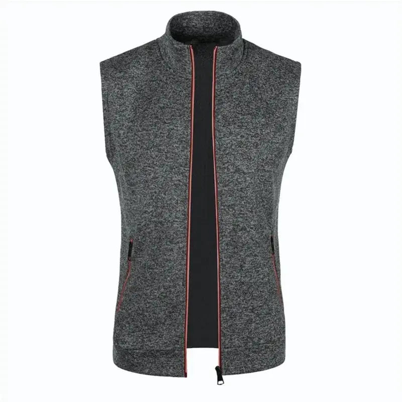 Men's heather grey sleeveless zip-up vest with stand collar, red piping and zip pockets.