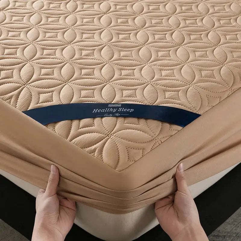 Simples Market beige quilted mattress protector with 30cm deep pocket; waterproof, antibacterial, breathable.