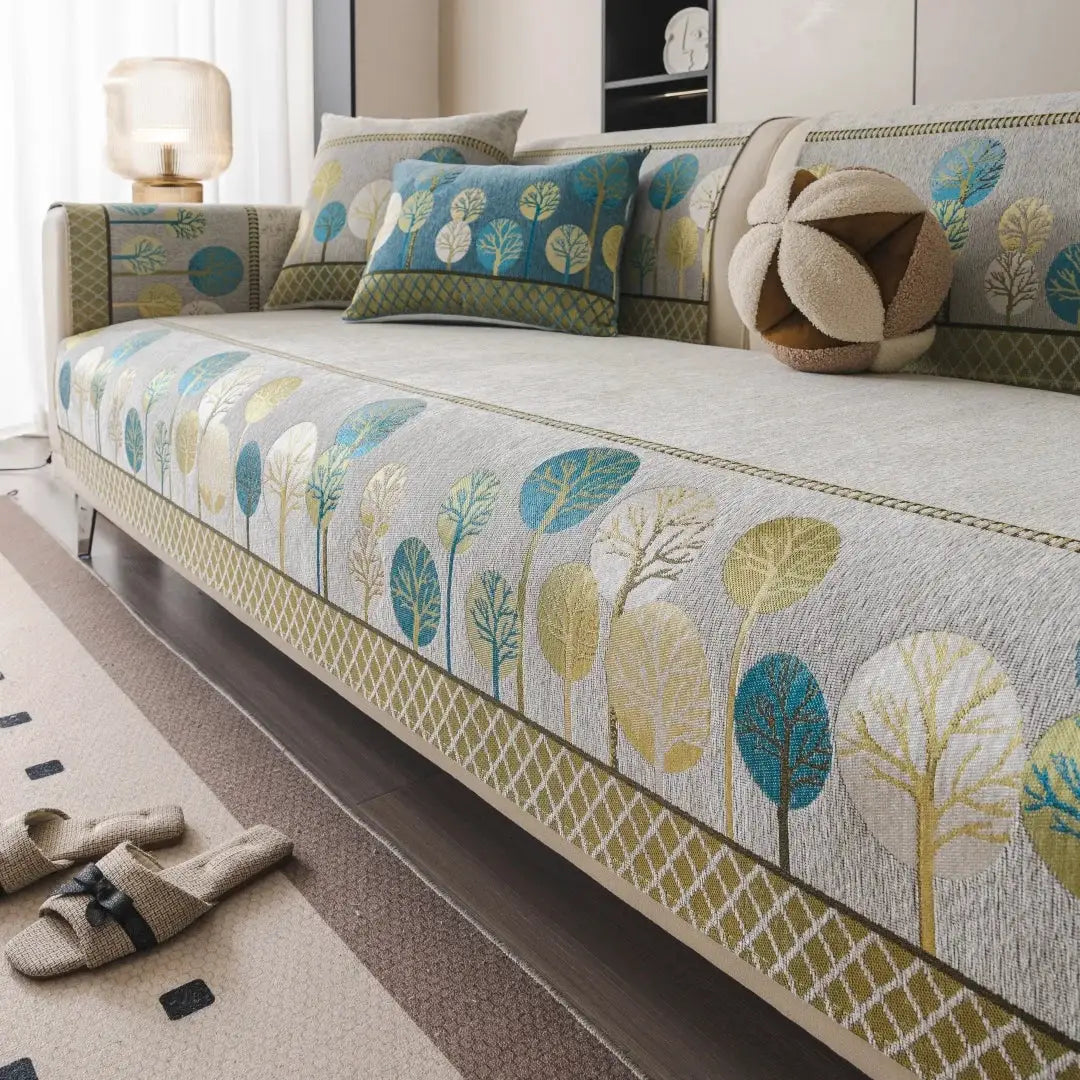 Simples Market Boho Full Moon Tree Jacquard Chenille sofa cover with matching cushions; teal and olive leaves