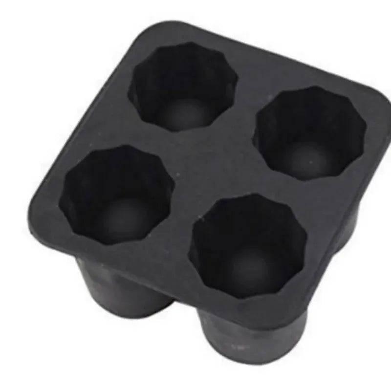 Silicone ice cube mold with four holes; black, round cup-shaped cubes for whiskey and cocktails.