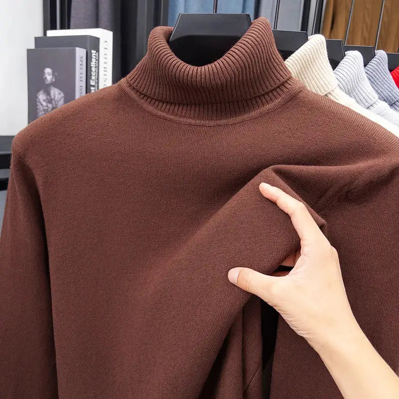 Men's brown knitted turtleneck sweater on display; other color variants seen in background