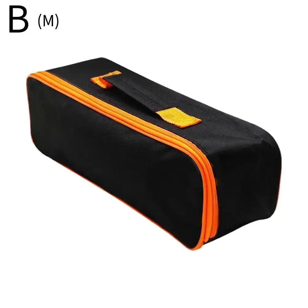 Portable tool bag in black Oxford fabric with orange zipper and handle