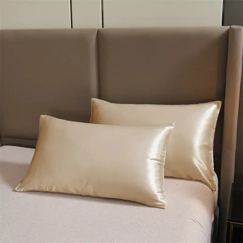 3pc satin duvet cover set with 2 champagne beige satin pillow shams on bed