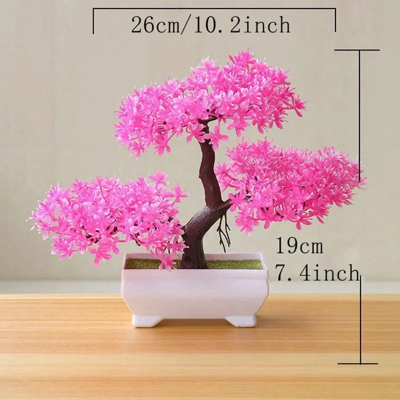 Artificial pink bonsai tree in white pot, decorative tabletop plant