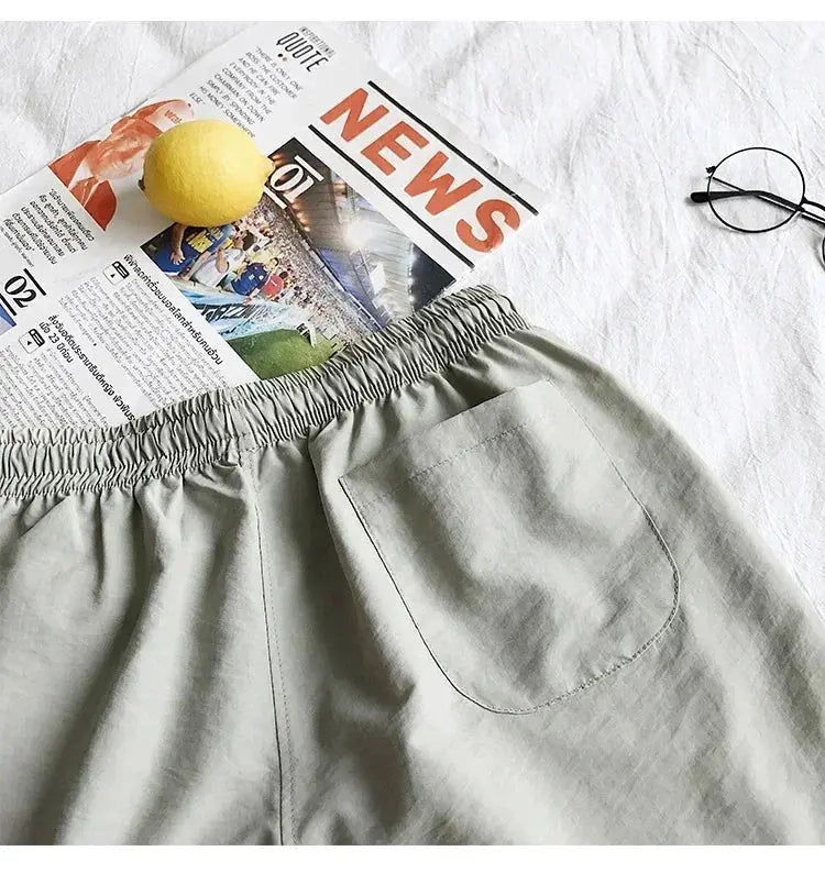 Simples Market 2024 Summer Men’s Swim Shorts Trunks in light gray with elastic waistband and back pocket