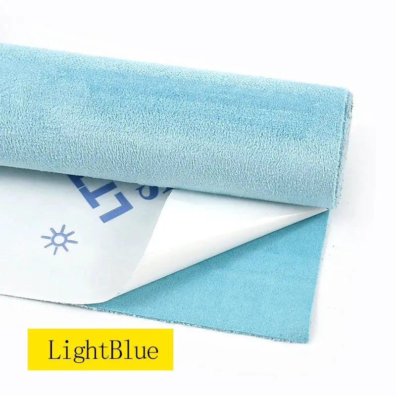 Self-adhesive faux suede fabric roll in Light Blue by Simples Market with peel-and-stick backing