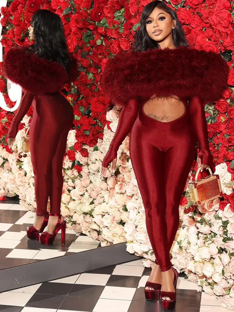 Sisterlinda burgundy furry slash-neck jumpsuit with cutout back, long sleeves, glossy stretch fabric; front/back views.