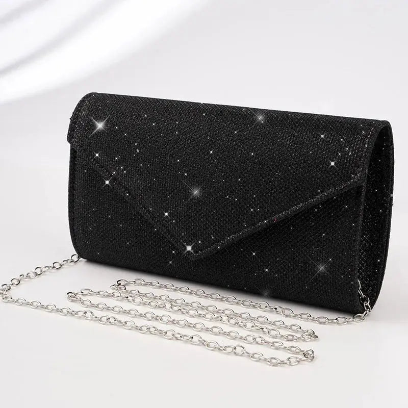 Glitter envelope evening bag by Simples Market in black with silver chain strap