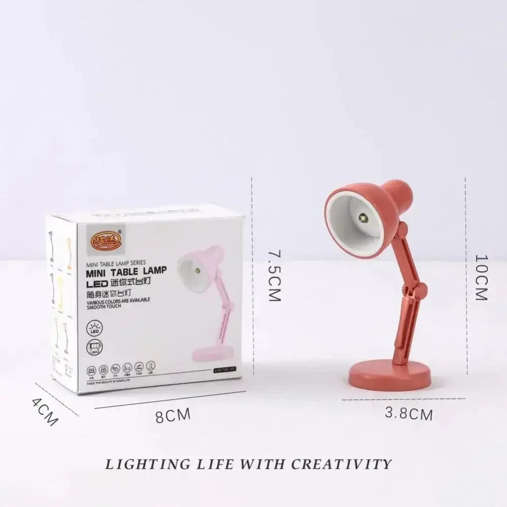 Mini Book Light With Clip LED Table Lamp by Simples Market, pink, foldable clip-on design; shown with its box