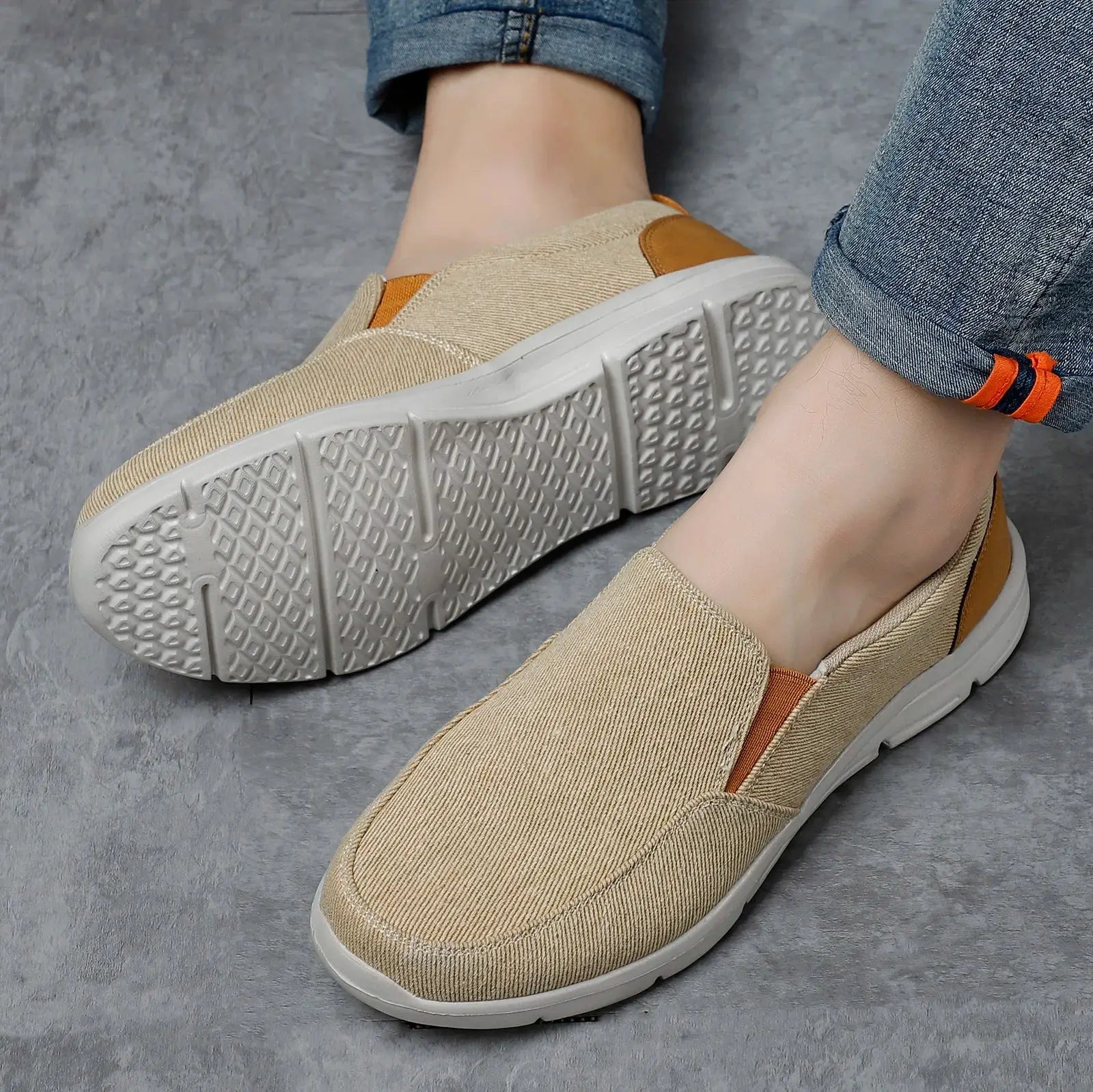 Men's canvas slip-on sneakers by Simples Market, beige fabric with orange trim and white sole