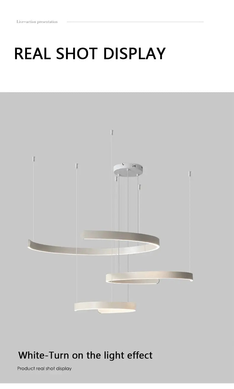 Modern ring ceiling chandelier with three white LED rings suspended at varying heights.