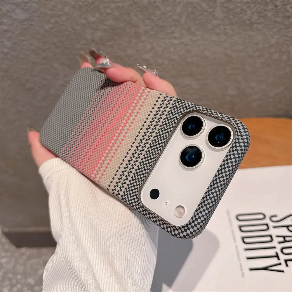 Kevlar carbon fiber PC iPhone case with pink-to-gray gradient checker pattern and camera bumper