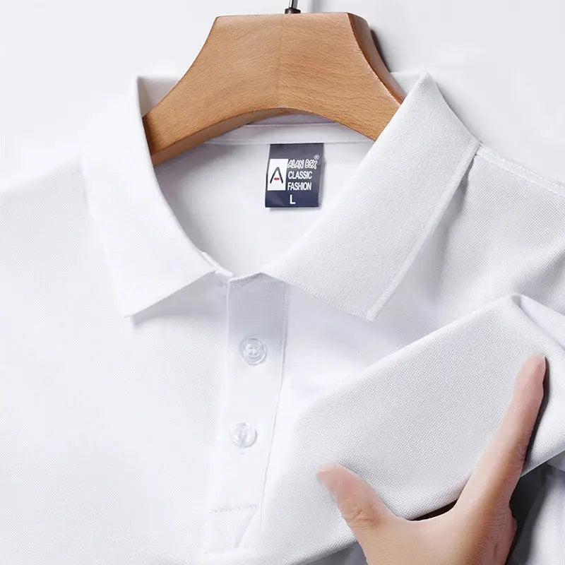 Men's white polo shirt on hanger; textured knit fabric, short sleeves, button placket.