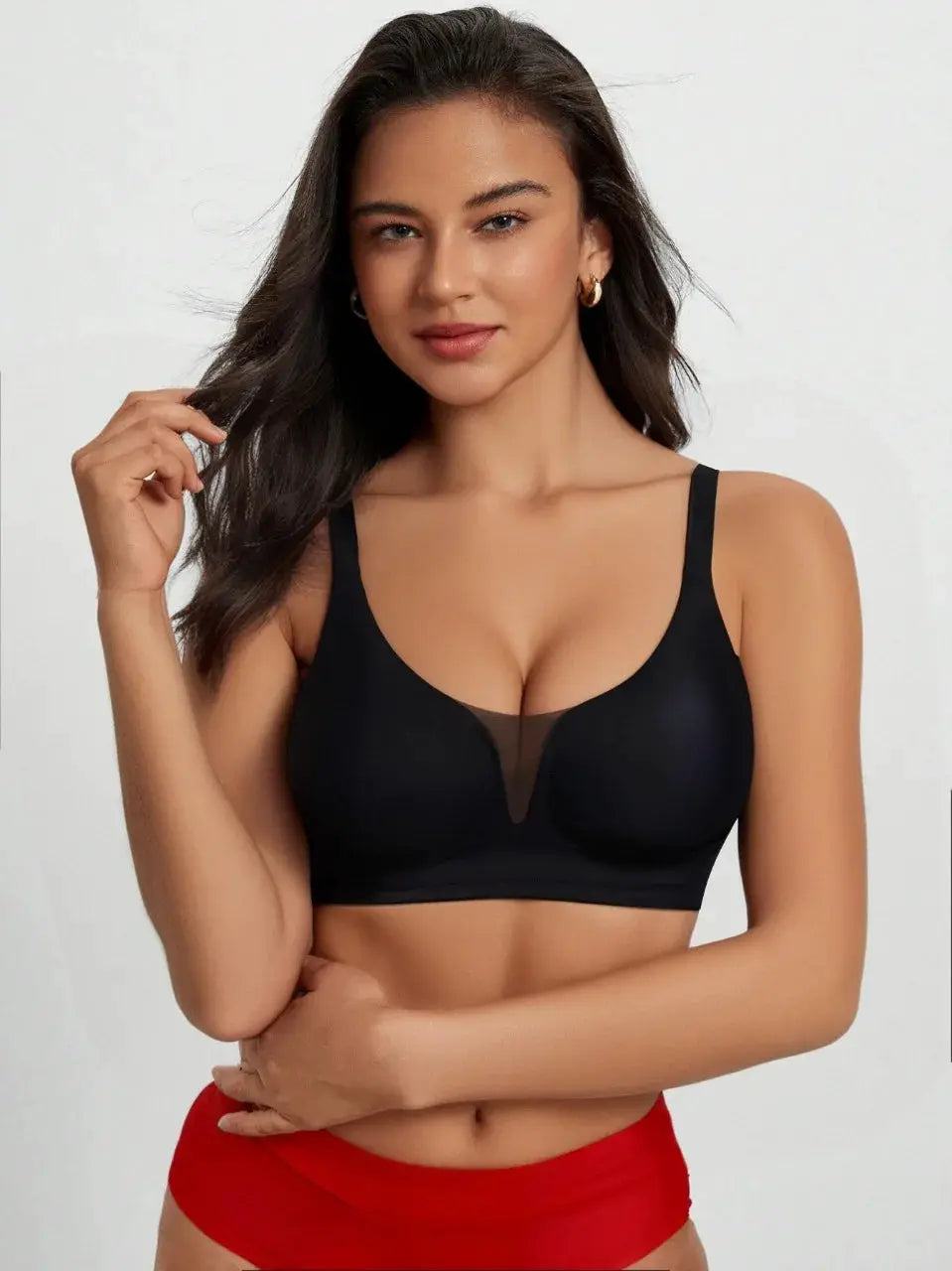 Plus-size black seamless wireless bra with front mesh V-panel and wide straps