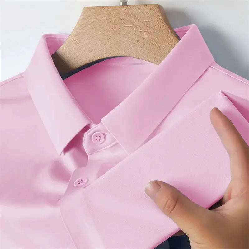 Men's pink solid-color short-sleeve shirt by Simples Market on a hanger