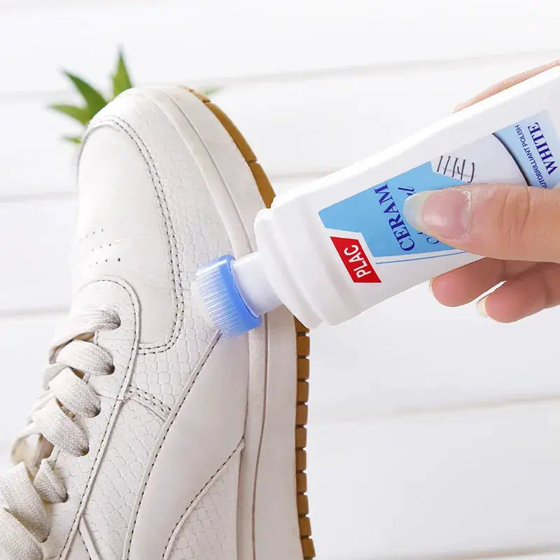 White shoe cleaner by Simples Market applied to a white leather sneaker