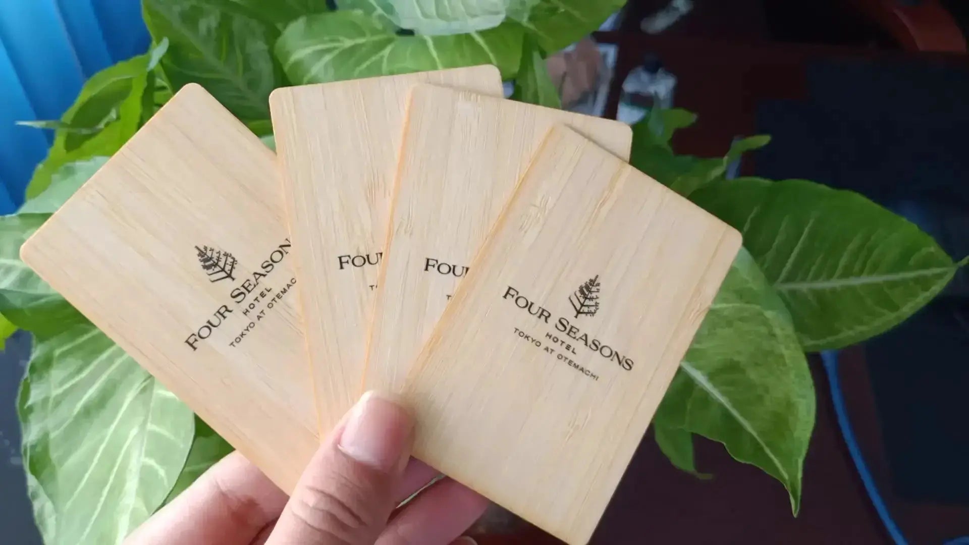 Wooden NFC cards set of five featuring Four Seasons Hotel branding; laser-engraved contactless RFID membership cards