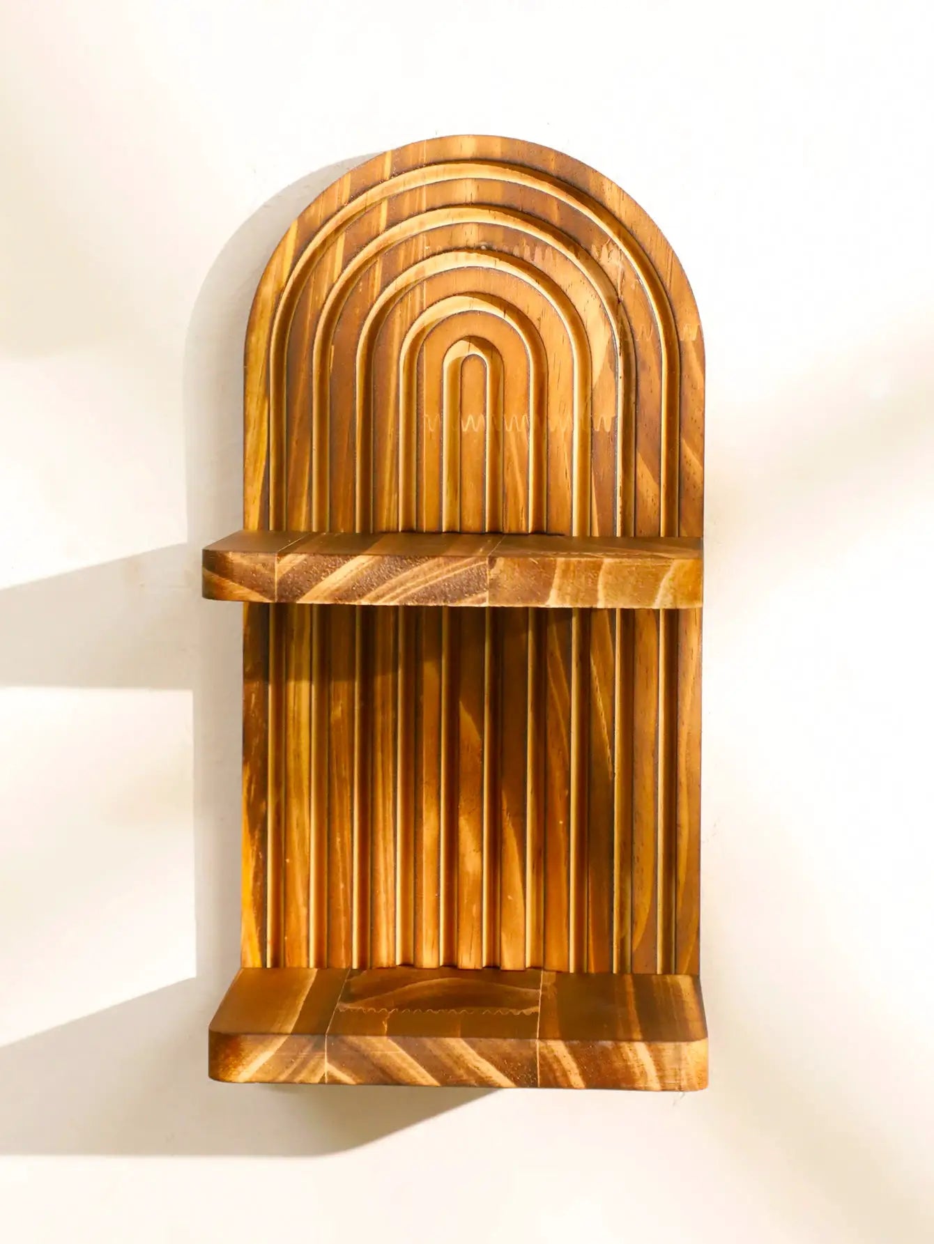 Wooden wall shelf with geometric arch panels in natural wood finish by Simples Market