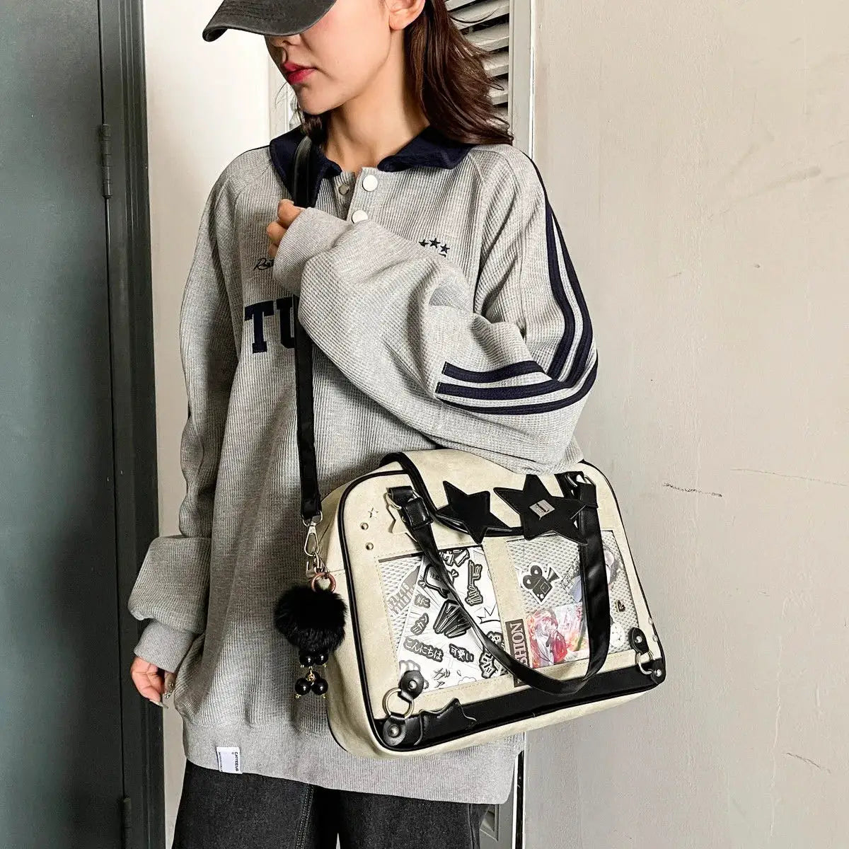 Y2K star ita bag crossbody with transparent pocket and manga-panel design, beige canvas with black trim