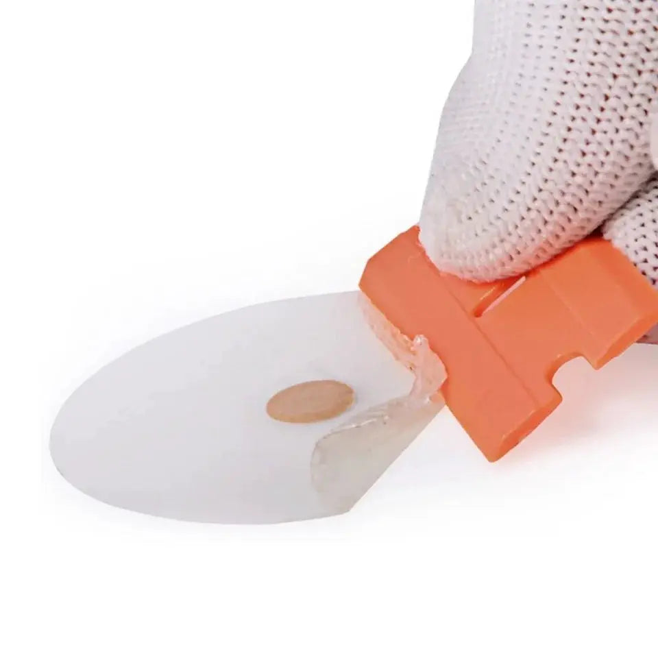 Simples Market orange plastic razor blade label remover scraper for window glass and car wraps.