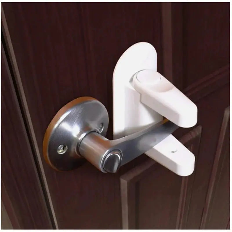 White plastic universal door lever safety lock with metal latch; adhesive mount for childproofing doors.