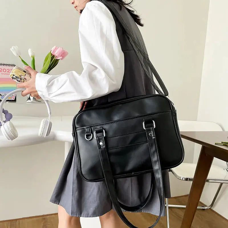 Simples Market Japanese style JK bag, black PU leather shoulder bag with crossbody strap and front buckle straps