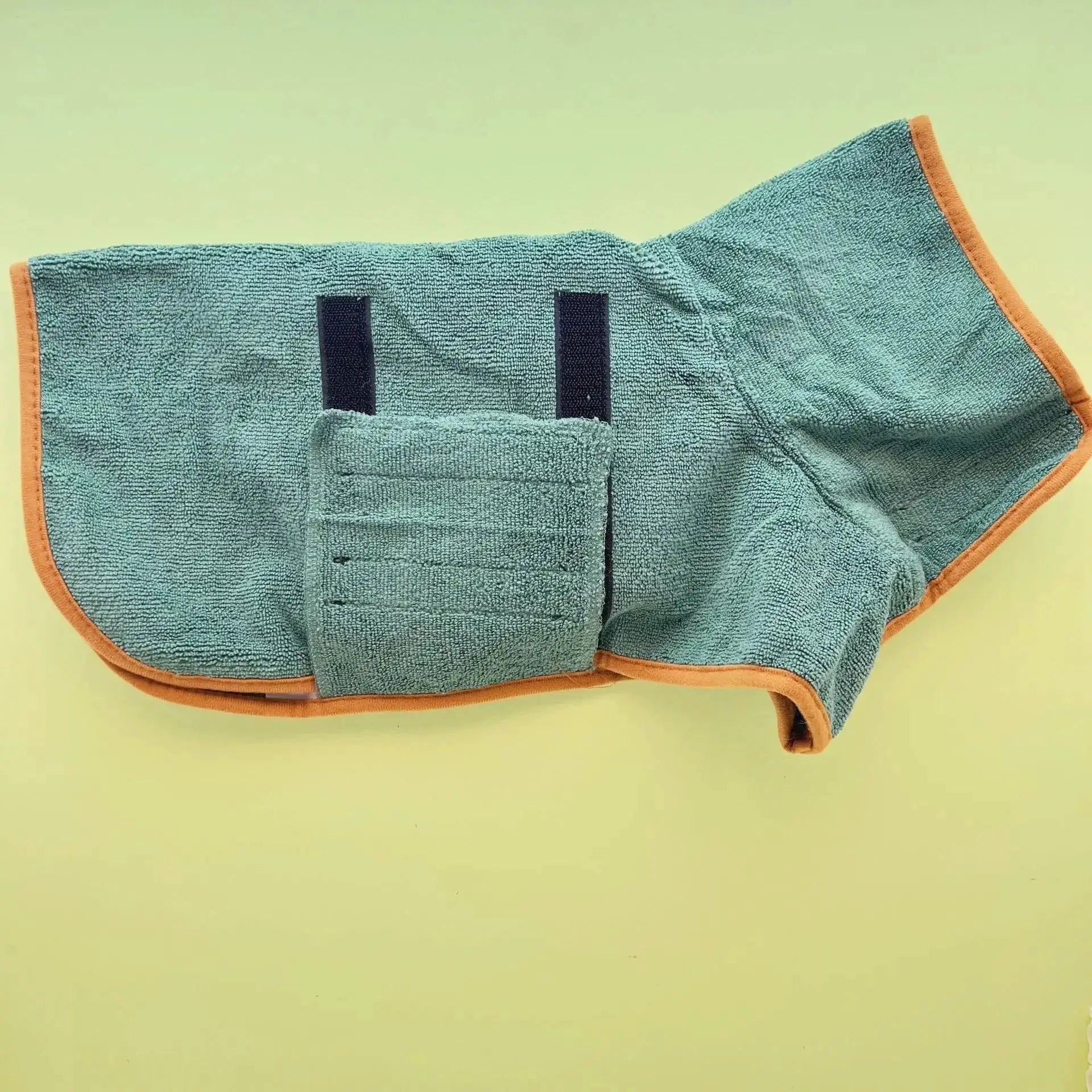 Dog bathrobe towel in teal with orange trim; absorbent full-body pet towel for dogs and cats.
