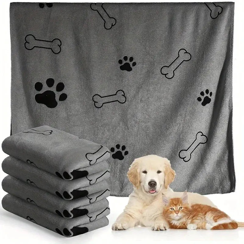 Dog towel set by Simples Market; grey microfiber towels with bone and paw print pattern, shown with a dog and cat.