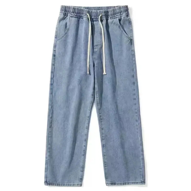 Men's light blue denim jeans with elastic drawstring waist and loose wide-leg fit by Simples Market