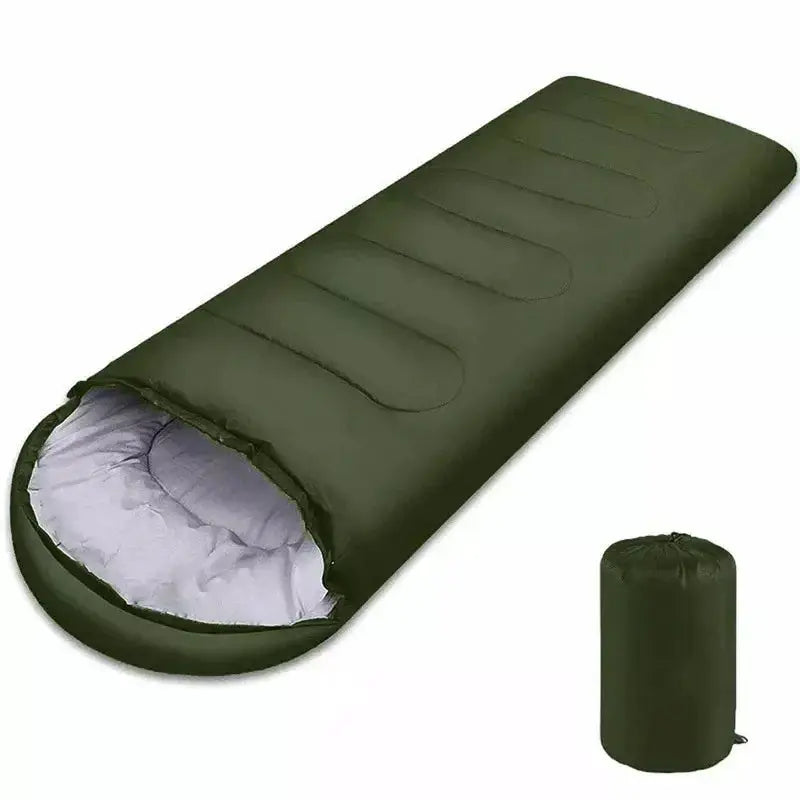 Sleeping bag by Simples Market; olive green ultralight waterproof envelope style with white interior and a stuff sack.