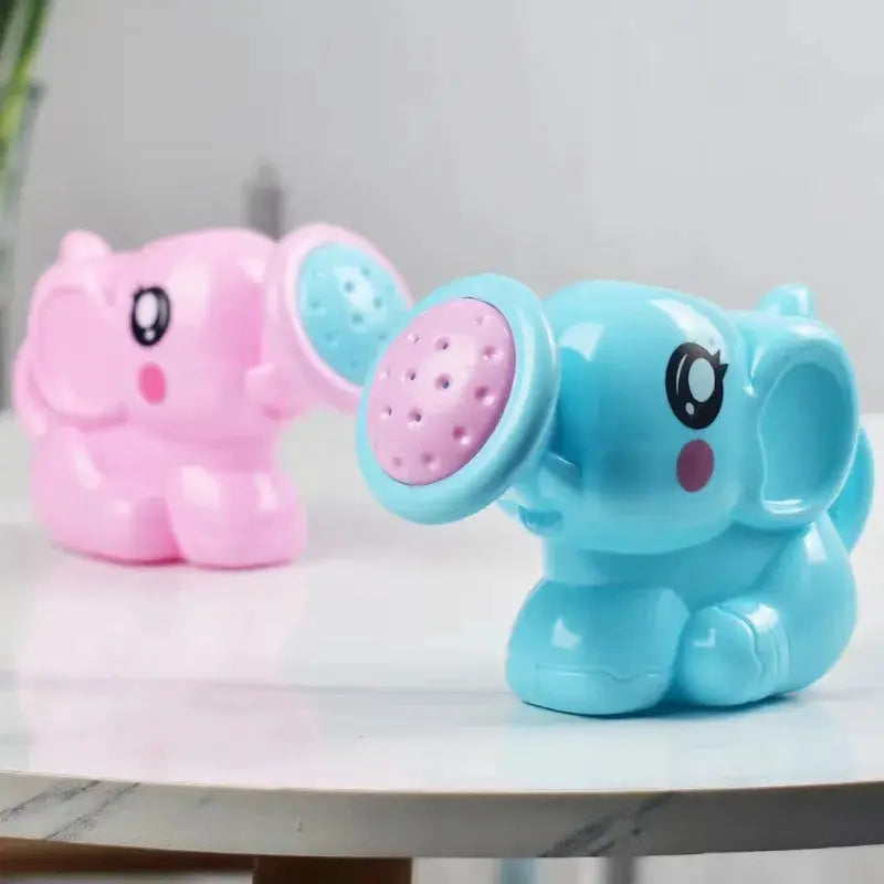 Plastic elephant bath sprinkler; two blue and pink bath toys by Simples Market