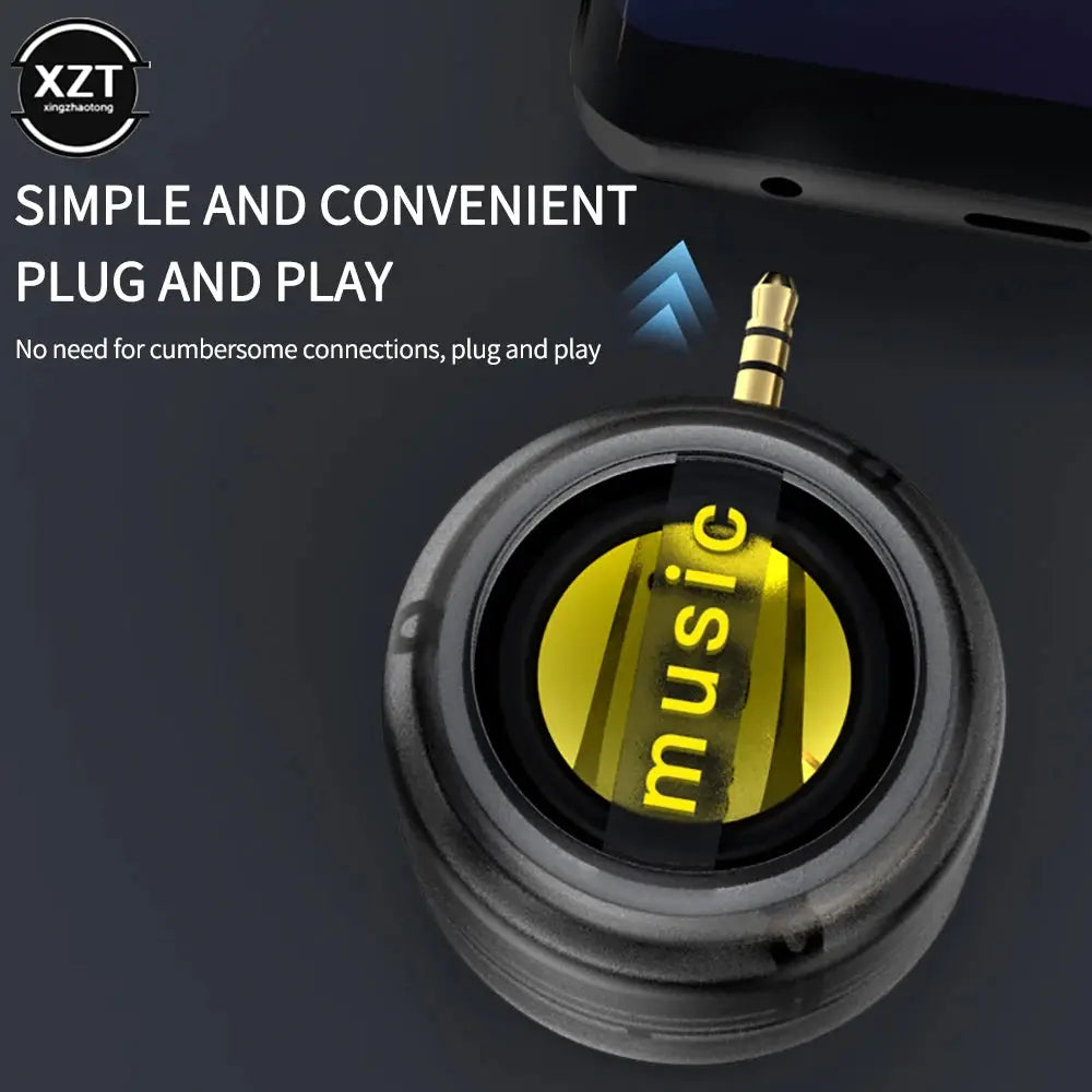 Music Sound Column Speaker by Simples Market; portable round black speaker with gold 3.5mm jack
