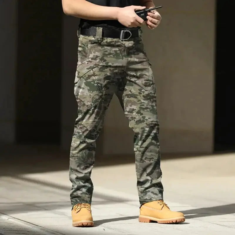 Men's Tactical Cargo Pants by Simples Market in camouflage; stretchy softshell with multiple pockets