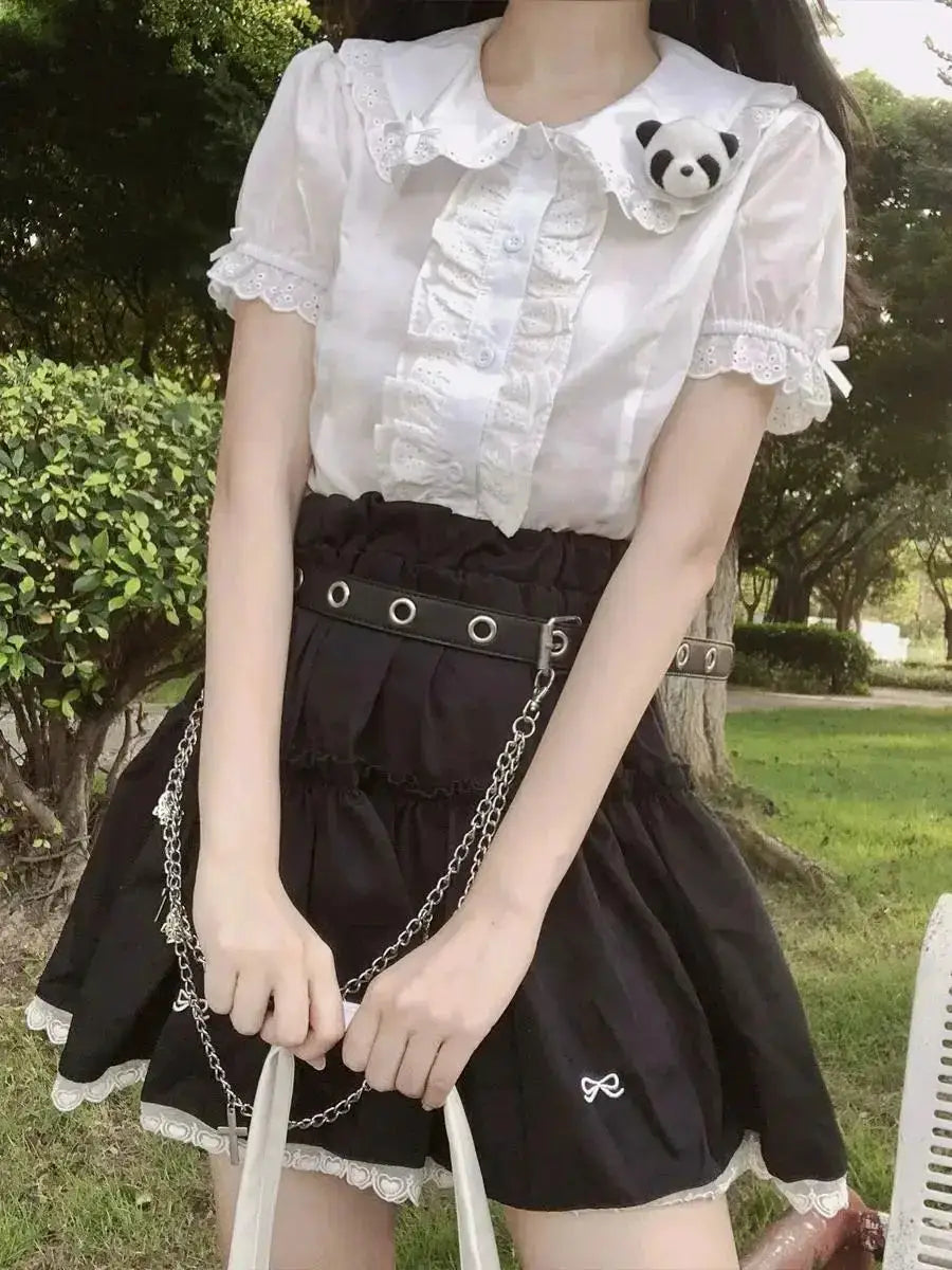 Deeptown Kawaii Lolita blouse in white with lace, ruffles and puff sleeves, panda pin accent