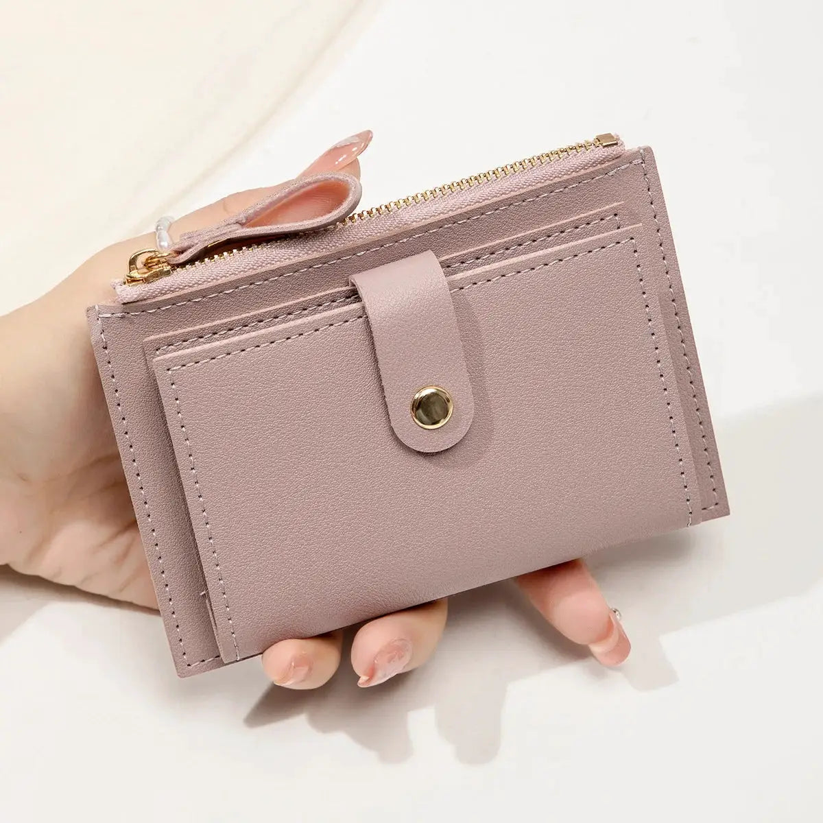 Simples Market women's short card wallet in dusty pink PU leather with zip closure and front snap strap