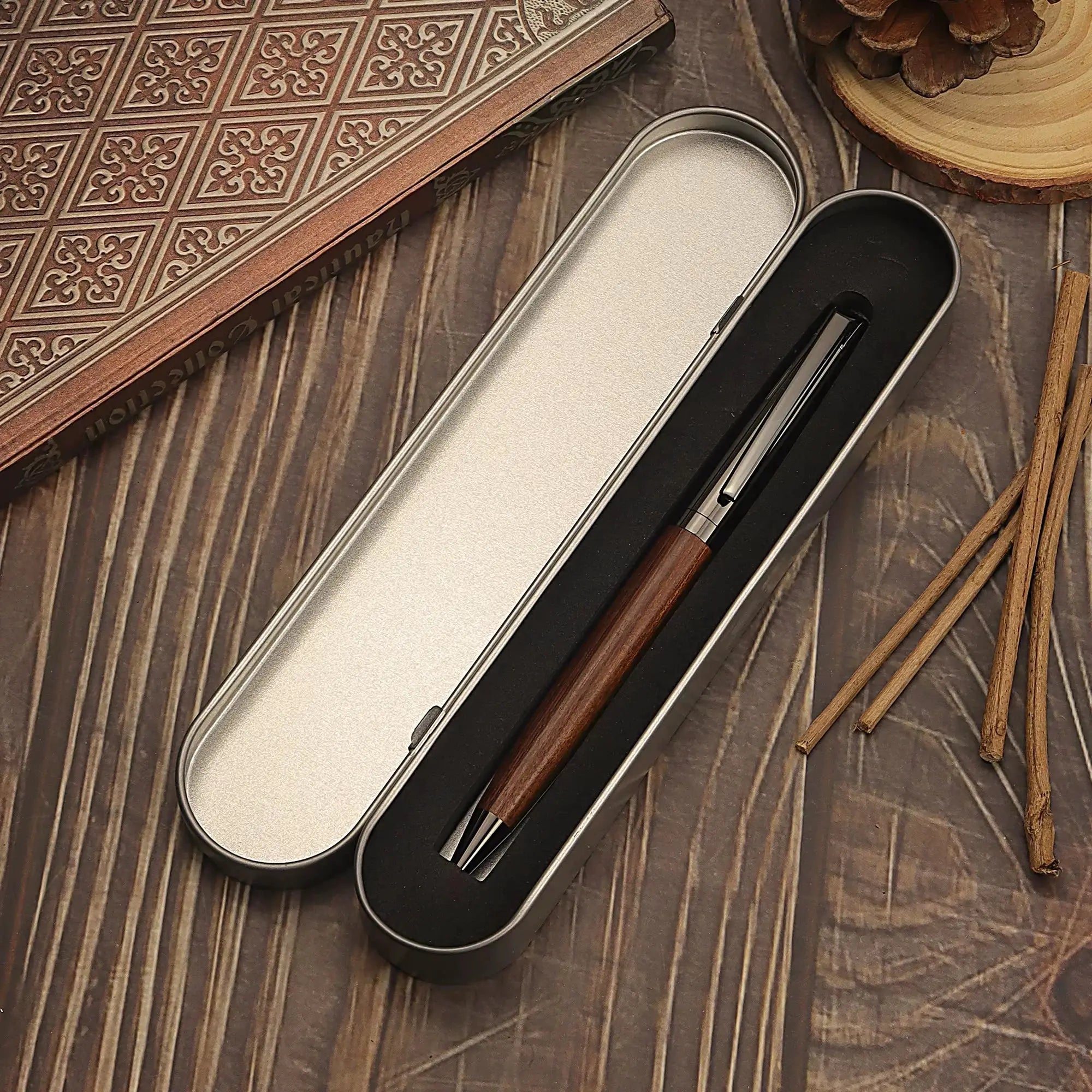 Metal ballpoint pen with wood barrel by Simples Market, black ink, in a metal tin case