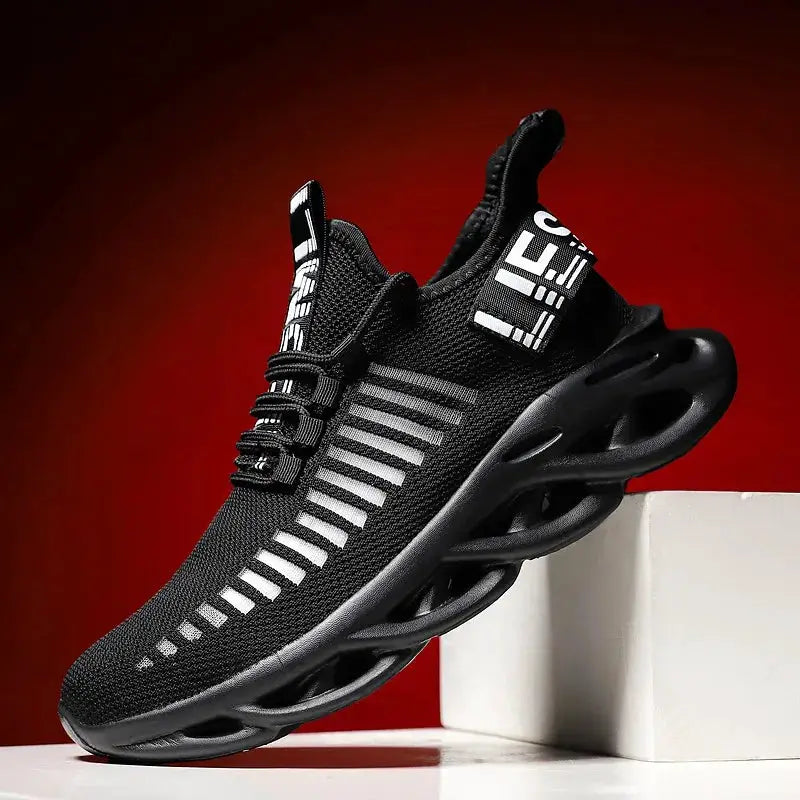 Unisex black knit running sneakers with white pull-tab text and hollow-arc sole