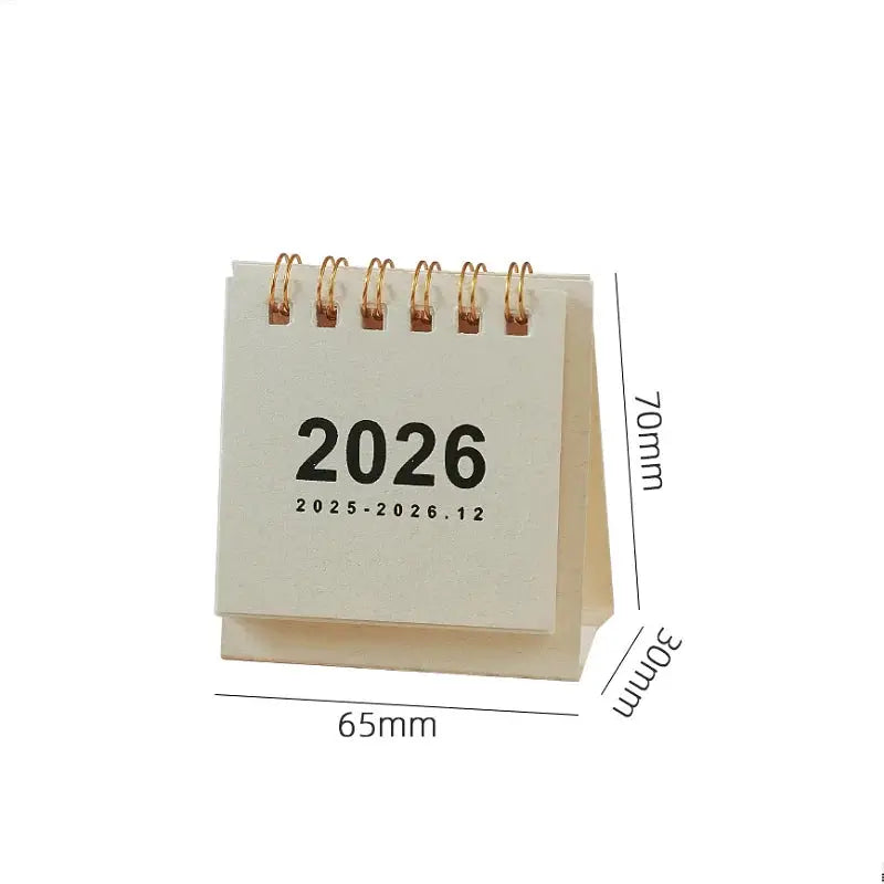 2026 mini desk calendar with copper coil binding on wooden stand