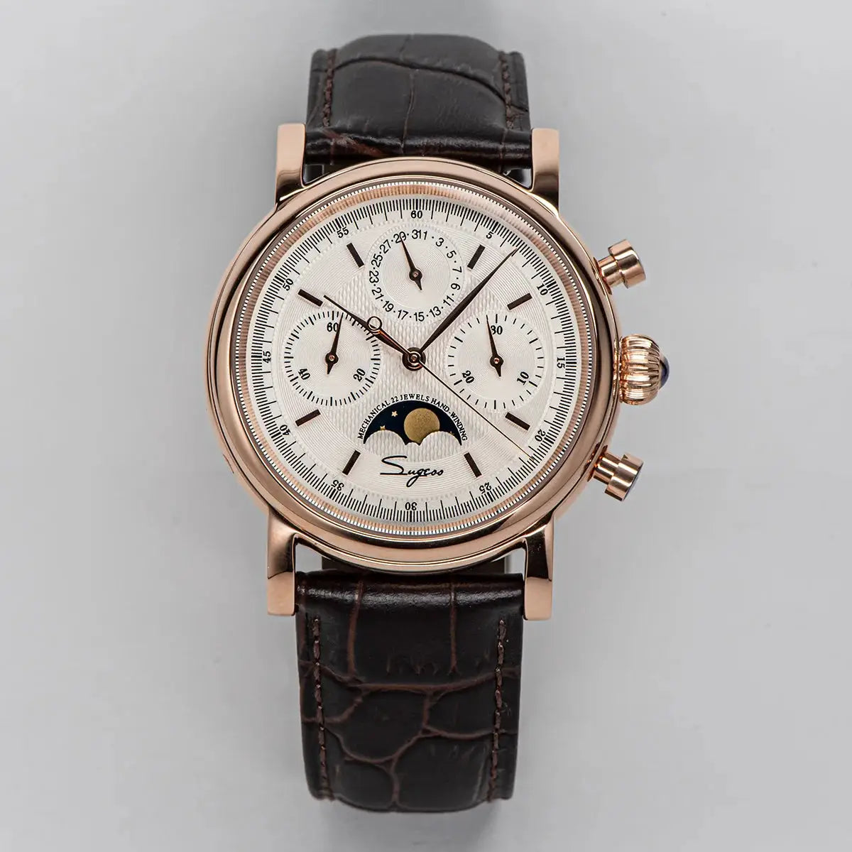 Sugess men’s wristwatch with rose-gold case, white dial, moonphase indicator, chronograph subdials, and brown leather strap