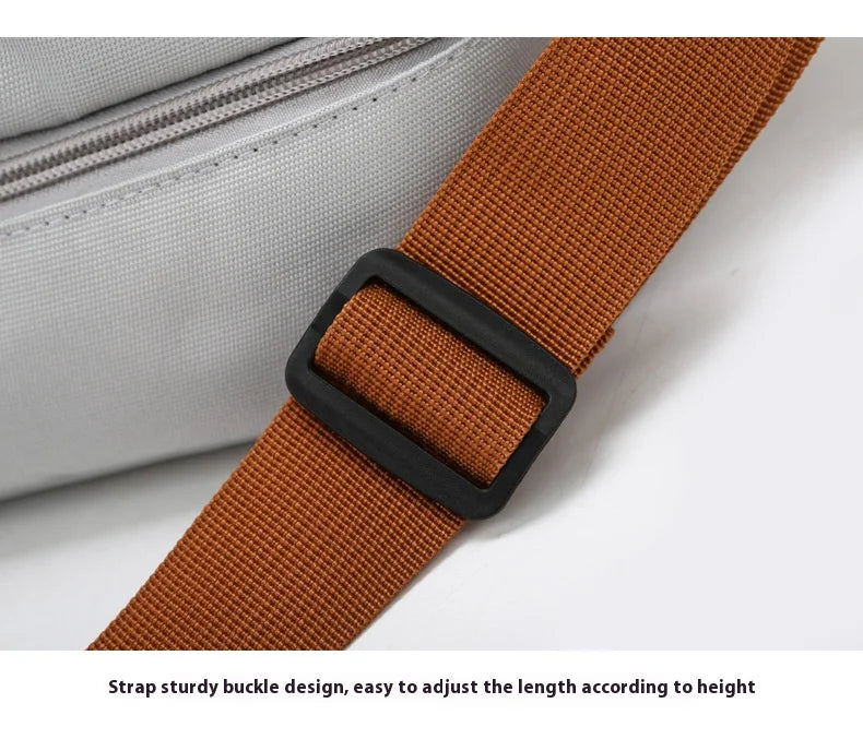 Simples Market large-capacity travel gym bag with orange strap and black buckle, grey body, shoulder crossbody style