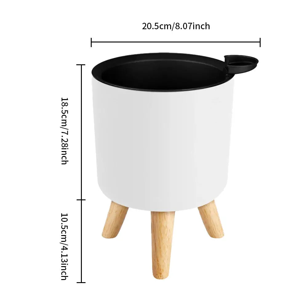 Floor-standing white round plant pot on three wooden legs with self-watering drainage system