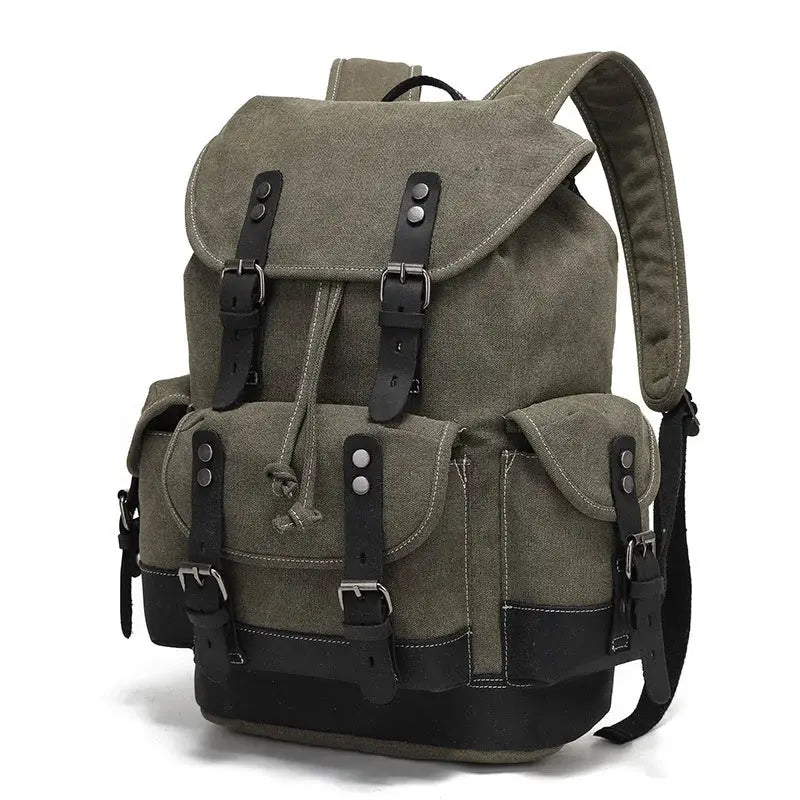 Vintage canvas backpack for men with buckle straps; olive green waxed finish, rugged travel daypack