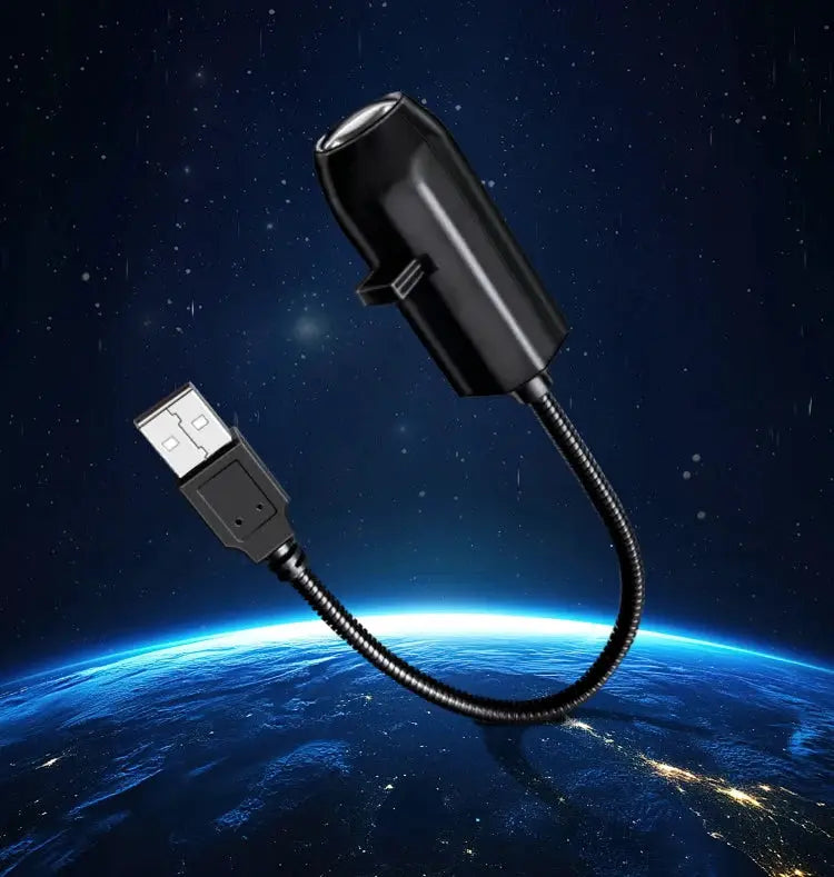 USB Halloween projector light; black compact projector with a coiled cable for night ambiance