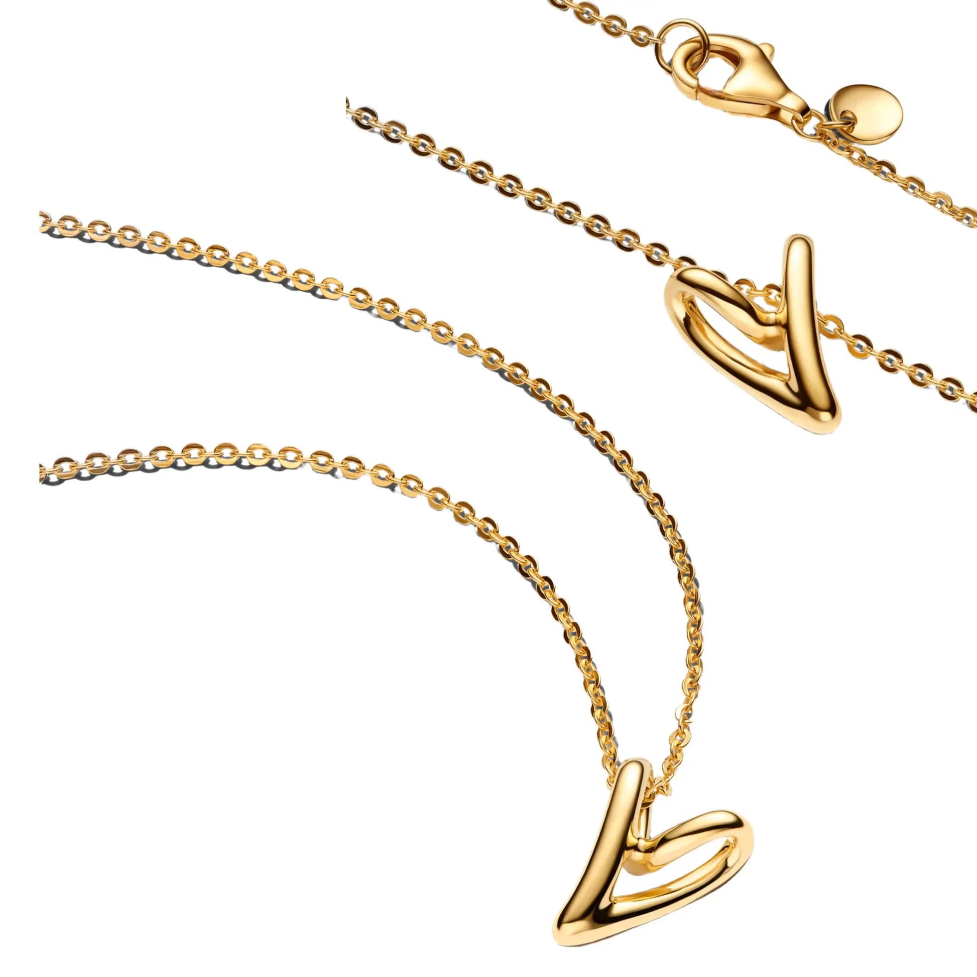 Gold-tone necklace with a smooth curved abstract pendant on a delicate chain with lobster clasp.