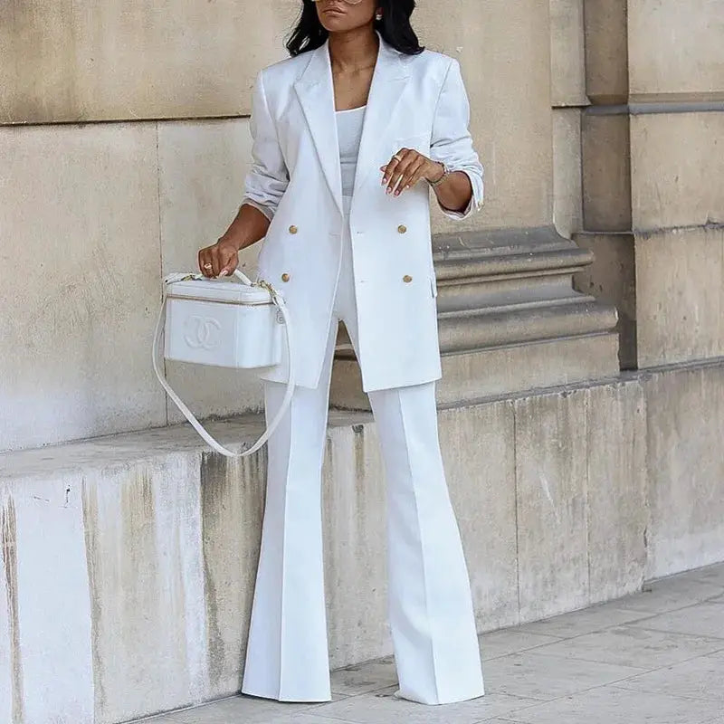 White 2-piece blazer and pants suit with gold buttons, Chanel handbag included