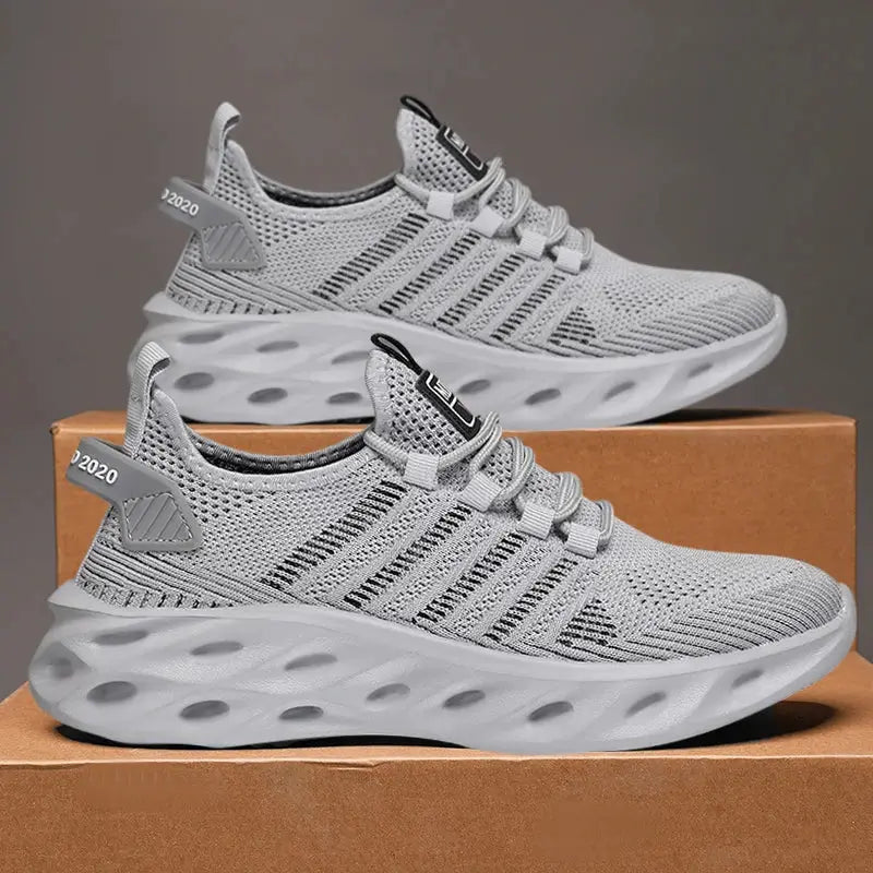 Pair of unisex breathable knit sneakers with a chunky molded sole