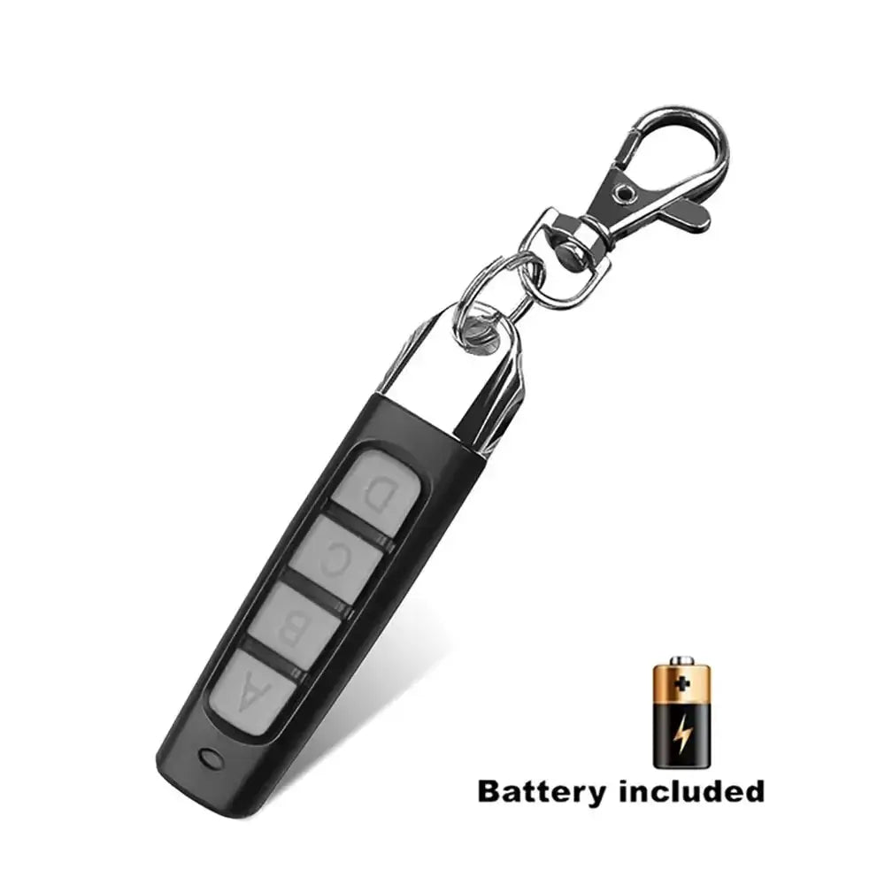 433MHz garage door remote key fob, black with metal clip and four grey buttons; battery included