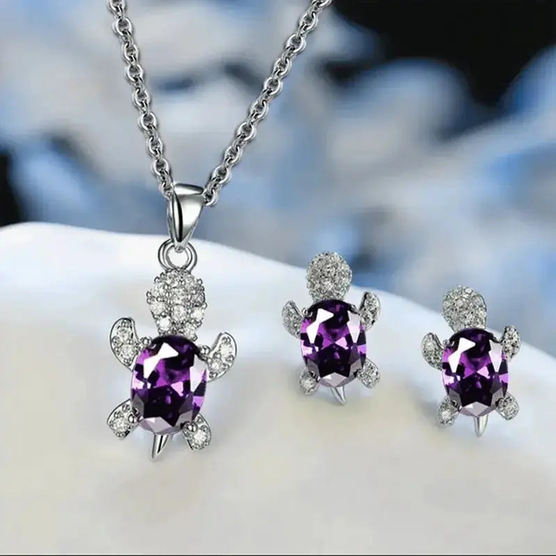 3pc turtle-shaped necklace and earrings set, silver-plated with purple glass stones and clear crystals