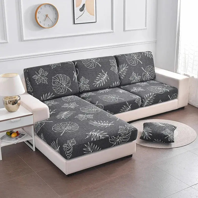 Simples Market elastic seat cushion cover for sofa; dark gray fabric with white botanical leaf pattern on sectional cushions, washable